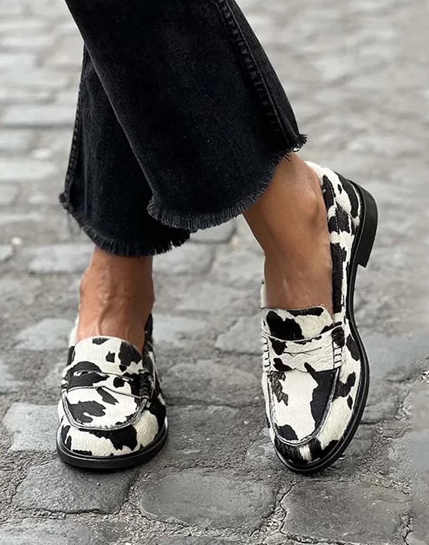 Giselle | Women's Cow Print Slip-On Loafers - Black/White - Image 1